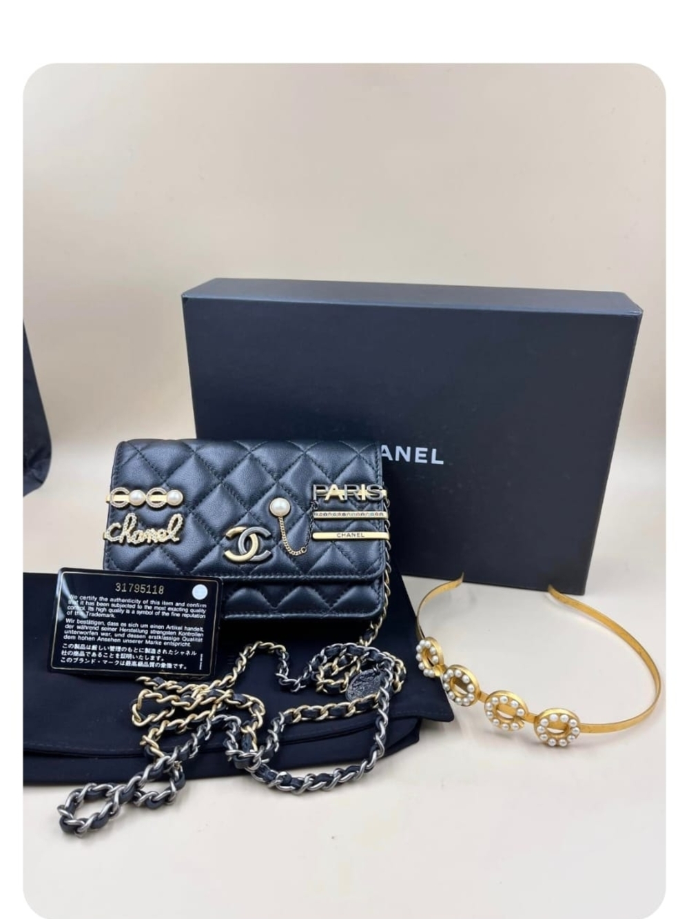 CHANEL Black Quilted Leather Chain Wallet with Gold Accents and Pearl Details - Picture 2 of 2